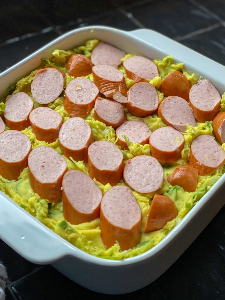 kruidige andijviestamppot met rookworst en kerrie