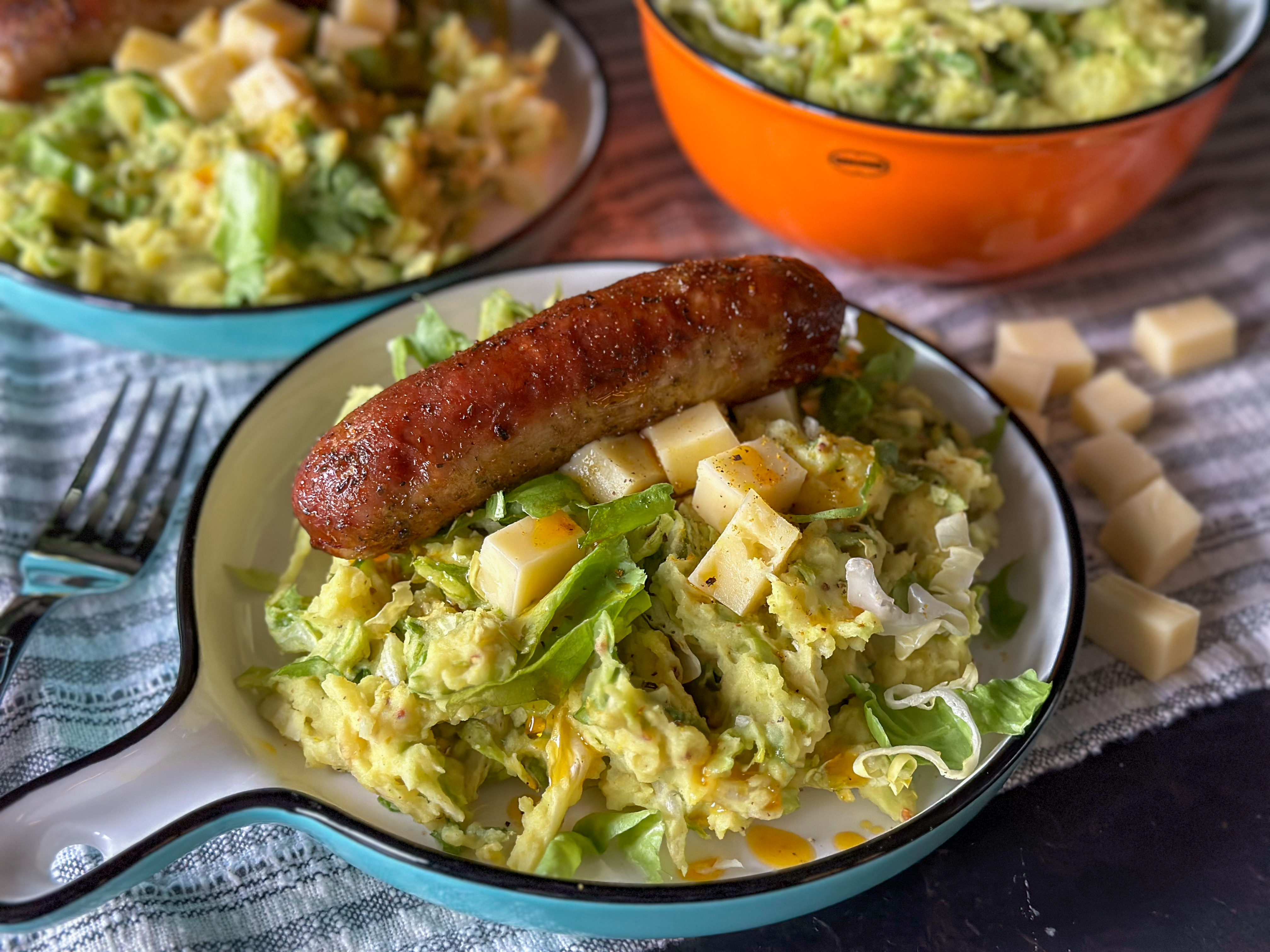 andijviestamppot met kerrie en verse worst uit de oven