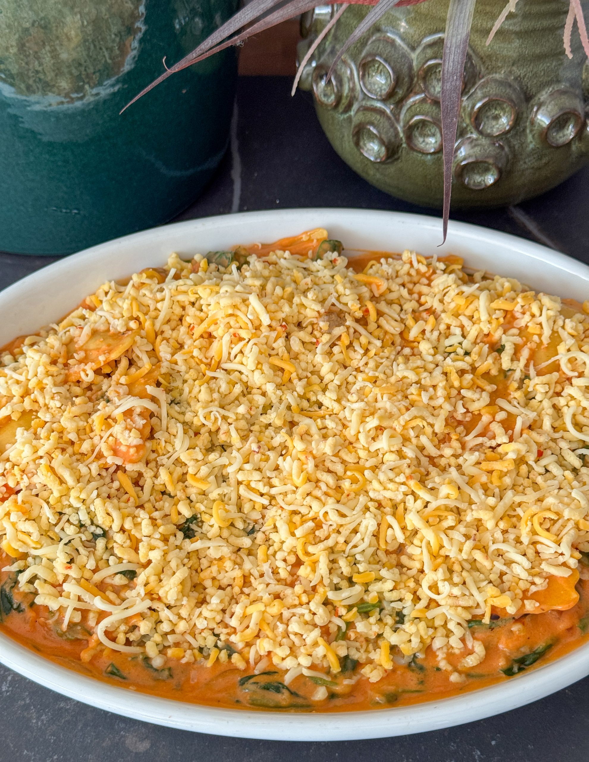 Romige ravioli ovenschotel met spinazie